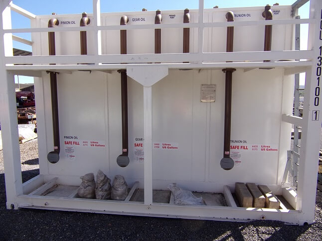 multi compartment oil storage tank on a mine site