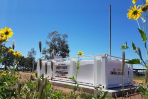 10000l self bunded tank on the farm, flowers, blue sky