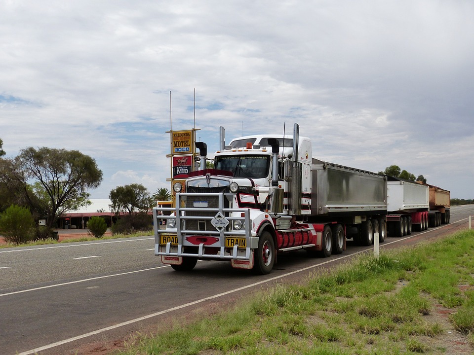 semi-trailer on road. Awarenesss around trucking emissions.